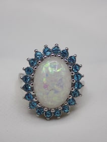 Beautiful fire opal and blue topaz sterling silver ring. Size 7