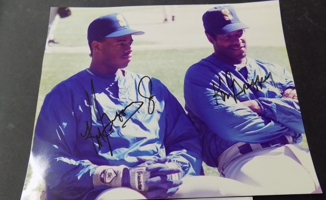 Ken Griffey Jr. and Sr. autographed photo: Ken Griffey Jr. and Sr. autographed photo. Please see photos. I personally got autographs at a sports card show years ago. 9 ¾ x 8 inches