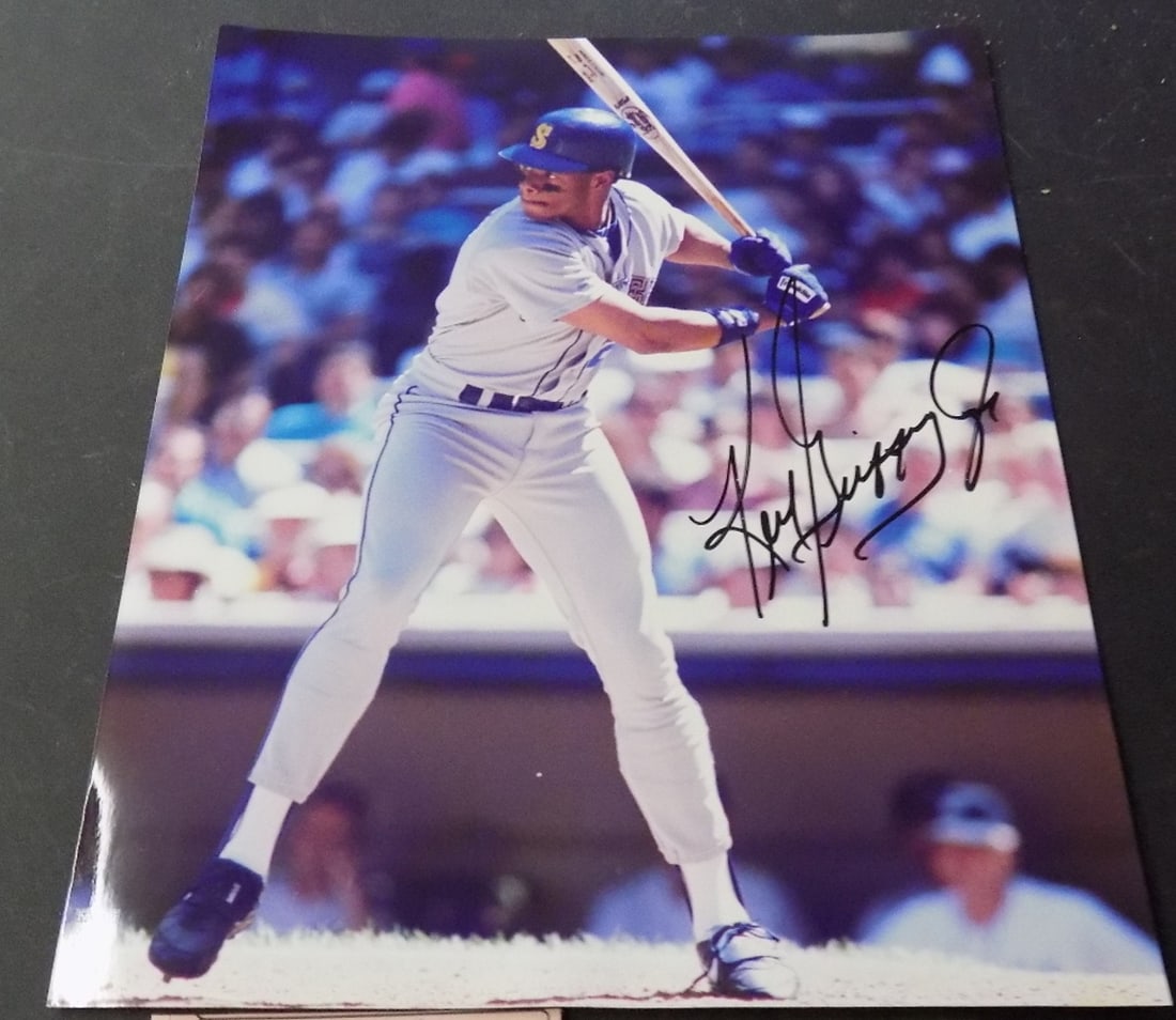 Ken Griffey Jr. autographed photo: Ken Griffey Jr. autographed photo. Please see photos. I personally got autographs at a sports card show years ago. 9 ¾ x 8 inches