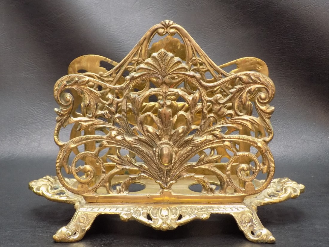 Elaborate antique Bradley and Hubbard brass letter or napkin holder: Elaborate antique Bradley and Hubbard brass letter or napkin holder. Marked on bottom as shown in photo. Great quality and detail. In very good original as found condition. 7 inches tall x 9 ¾ wi