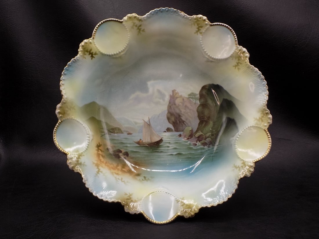 Beautiful vintage RS Prussia bowl with ship in lake and mountain scene: Beautiful vintage RS Prussia bowl with ship in lake and mountain scene. Gold highlight on rim. Beautiful molded shape. Great quality and detail. Marked on bottom as shown in photo. 10 ½ x 2 ¾