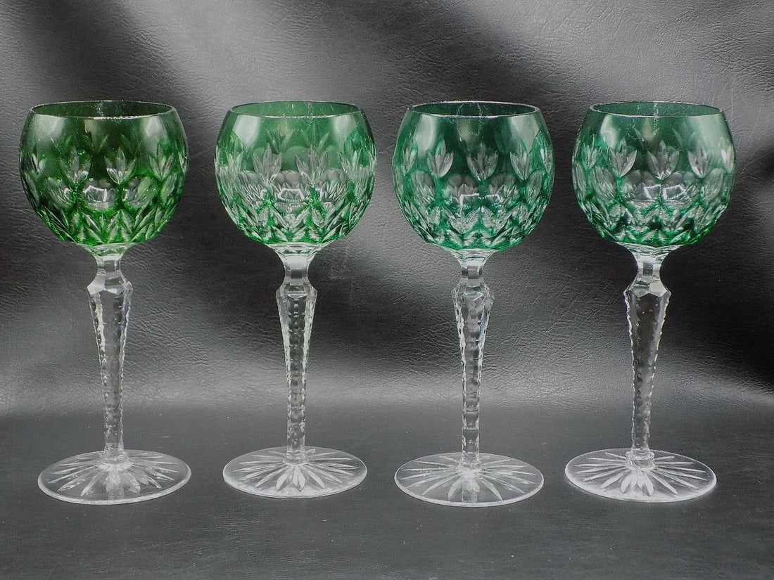 Beautiful vintage deep green cut to clear art glass wine glasses.: Beautiful vintage deep green cut to clear art glass wine glasses. Great quality and detail. In very good original as found condition. Color is darker than showing in photos. 7 ¾ inches tall. 2 7/