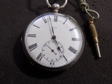 Antique key wind pocket watch
