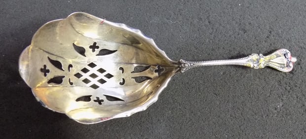 Antique sterling silver tomato spoon