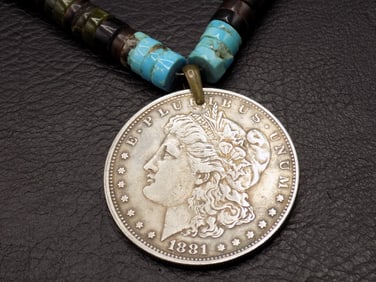 Native American Indian beaded necklace with 1881 S silver dollar.
