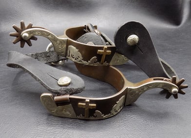 Fine ornate decorated pair of cowboy spurs