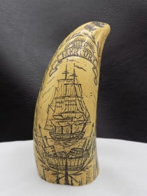 Great scrimshaw faux tusk.