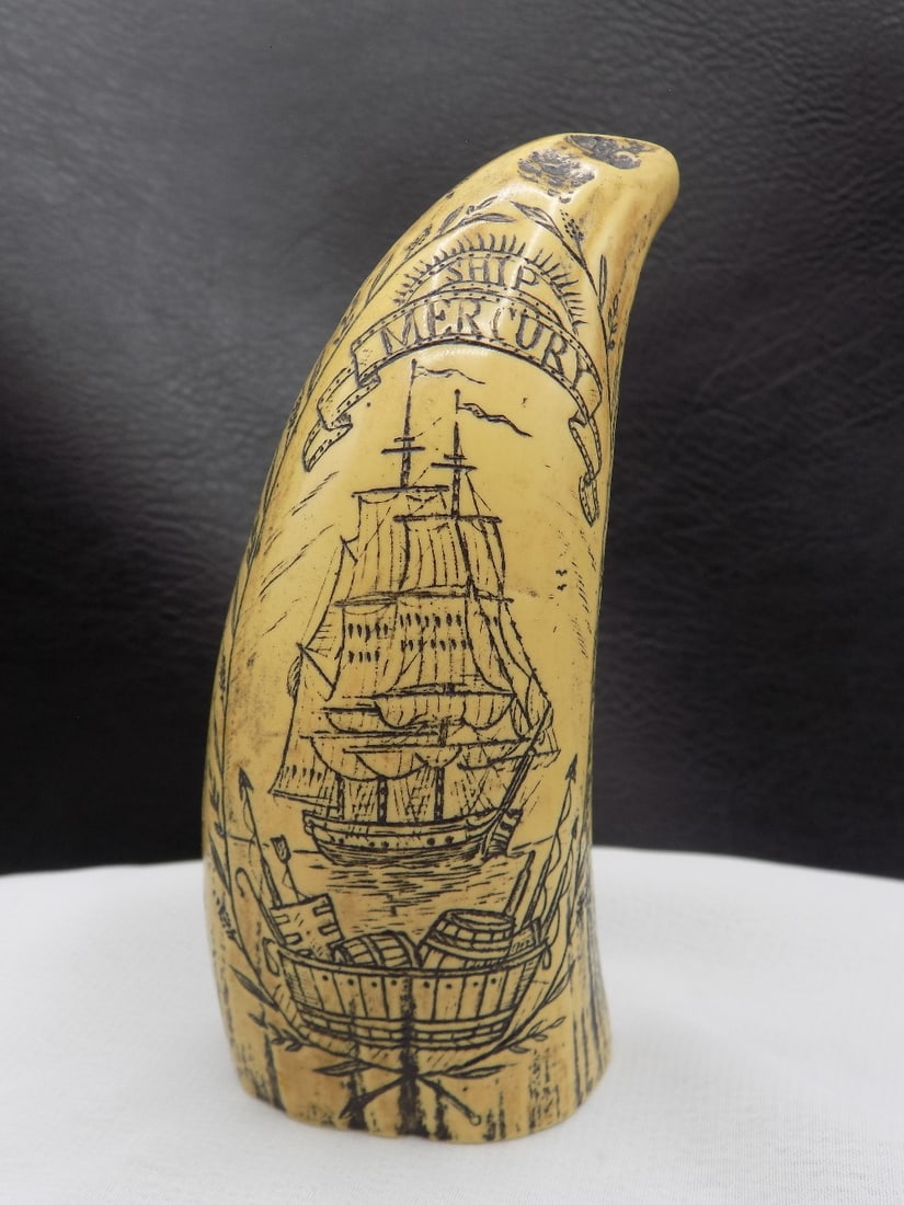 Great scrimshaw faux tusk.: Great scrimshaw faux tusk. 4 inches long. Please see photos.