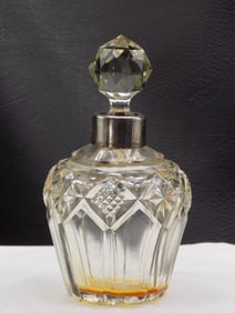 Art deco cut glass perfume bottle with silver rim