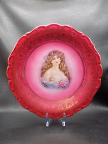 Beautiful vintage charger with lady portrait.