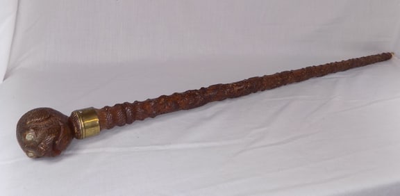 Highly carved antique cane with dog head
