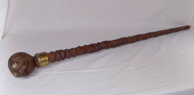 Highly carved antique cane with dog head: Highly carved antique cane with dog head. Marked 1904 on metal band as shown in photo. Great quality and detail. 38 inches long.