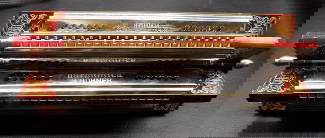 Rare 6 in one Hohner Harmonica in original box like new.