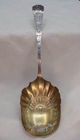 Ornate vintage sterling silver serving spoon