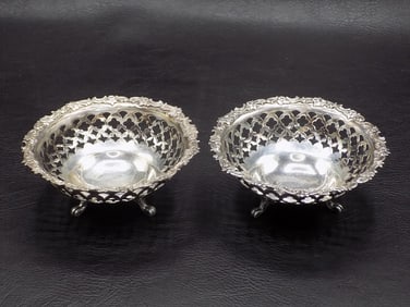 Pair of ornate sterling silver footed bowls