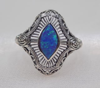 Beautiful 2 ct blue fire opal sterling silver ring