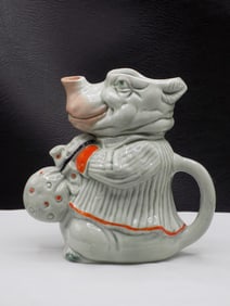 Vintage Schafer and Vater style rhinoceros cream pitcher.