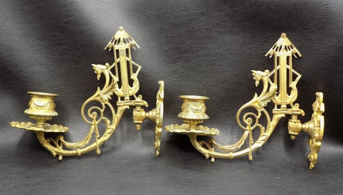 Exceptional pair of antique wall sconces.