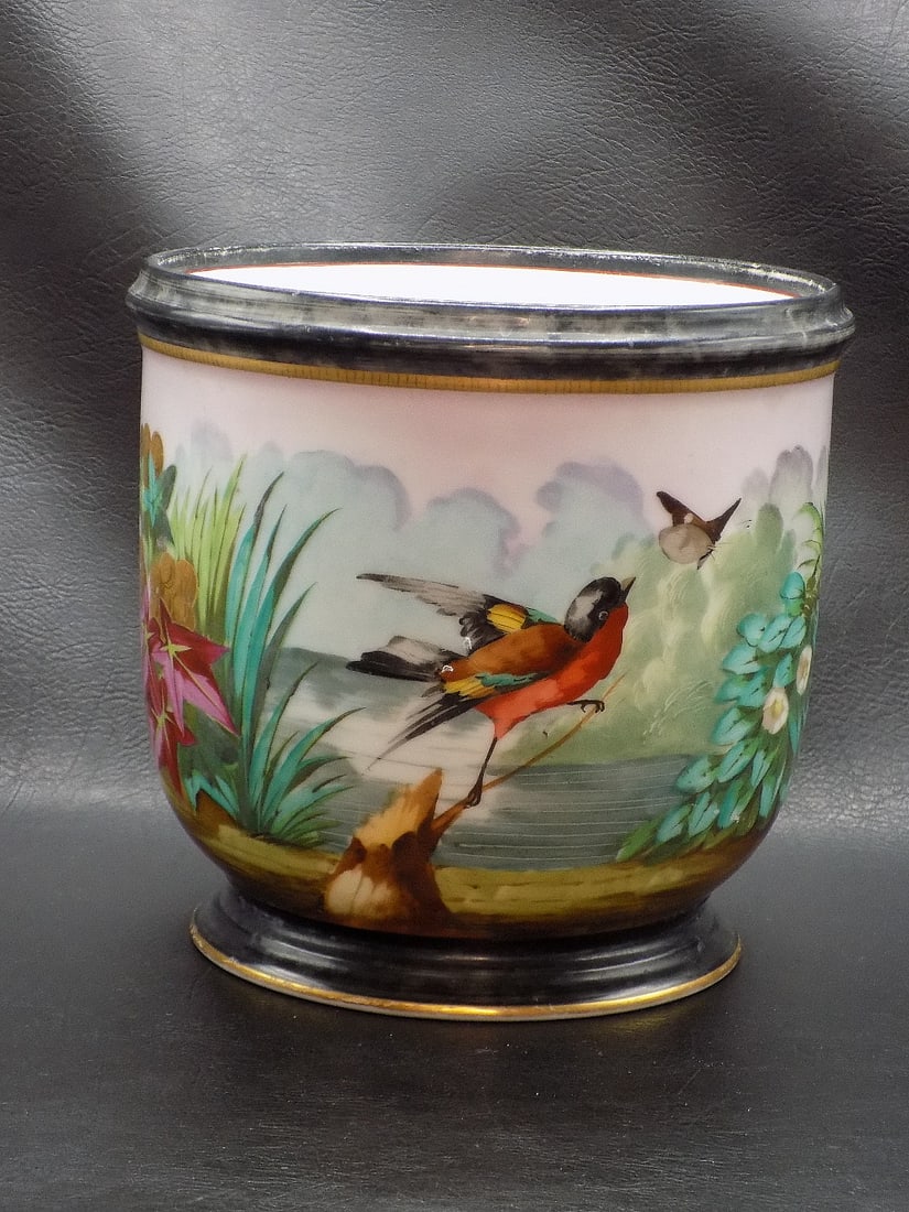 Pretty antique hand painted jardiniere with bird and butterfly.: Pretty antique hand painted jardiniere with bird and butterfly. Beautiful colors. Great quality and detail. In very good original as found condition. 6 ¾ tall x 7 inches wide at top rim.
