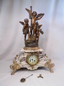 Great antique bronze signed E. Rousseau figural clock with cupids