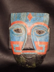 Unusual inlaid stone mask