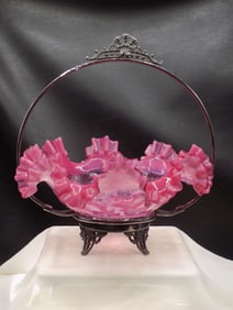 Pretty antique cranberry opalescent art glass brides basket.