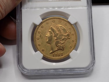1852 /1852 $20 gold coin. Graded AU by NGC