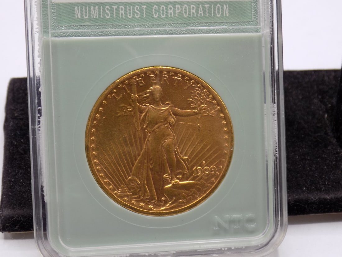 Uncirculated 1909 S $20 dollar gold coin.MS 64 graded: Uncirculated 1909 S $20 dollar gold coin. Graded MS64 by Numistrust Corporation. Please see photos. Payment through Live Auctioneer or bank to wire only. No credit cards.