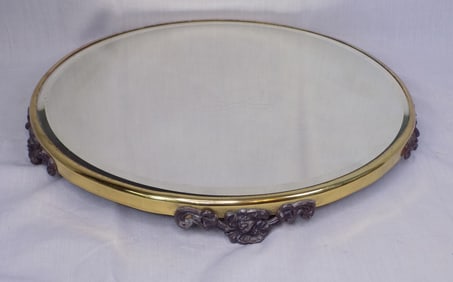 Late 1800s plateau with beveled glass mirror.
