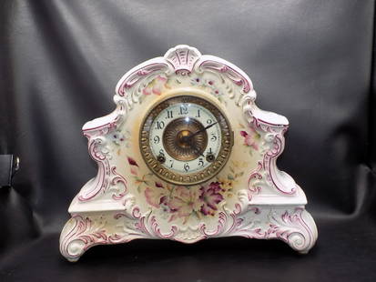 1905 floral decorated Ansonia clock in Dresden china case: 1905 floral decorated Ansonia clock in Dresden china case. Has key and pendulum. Beautiful colors. White porcelain dial. Wound tight and not running. Marked on back of case as shown in photo. 11 &frac