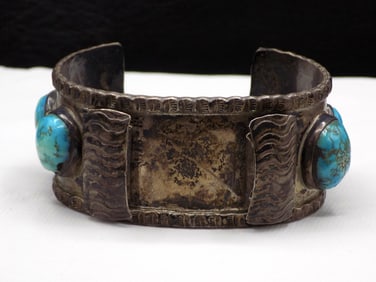 Vintage artist signed Native American Indian silver and turquoise mans watch band.