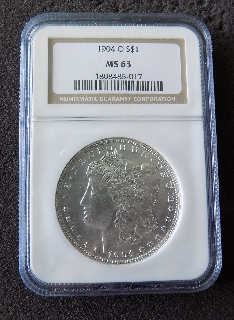 Uncirculated 1904 O graded MS63 Morgan silver dollar by NGC (1 of 4)
