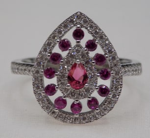 Beautiful 2 cwt rubies and topaz sterling silver ring