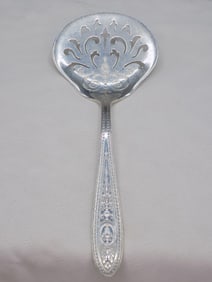 Fancy vintage International Wedgewood sterling silver serving tomato spoon
