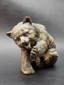 Neat vintage bronze bear with bees.