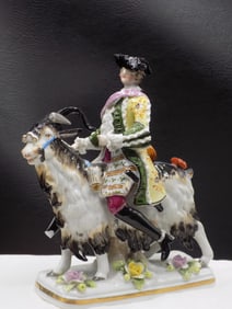 Antique Dresden figure of man riding goat