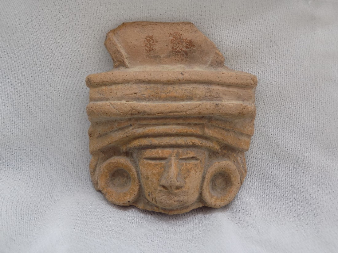Ancient pre Colombian artifact face figure. (1 of 6)