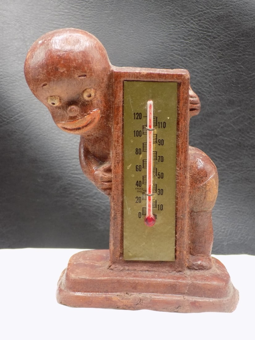 1949 Diaper Dan Black Memorabilia thermometer.: 1949 Diaper Dan Black Memorabilia thermometer. Looks to be made of pressed fiber wood. In very good original as found condition. Thermometer is not working. 5 ¼ inches tall