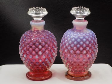Beautiful pair of vintage Fenton cranberry hobnail art glass perfume bottles.