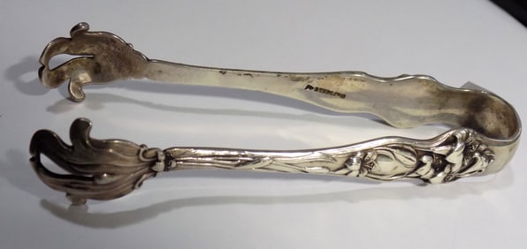 Ornate sterling silver sugar tongs