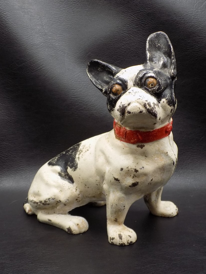 Antique cast iron French Bulldog doorstop: Antique cast iron French Bulldog doorstop. Probably Bradley and Hubbard. Beautiful colors. Great quality and detail. In very good original as found condition with wear to paint normal from use as show