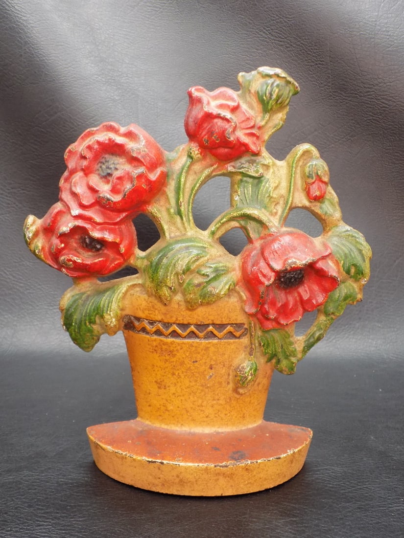 Vintage Hubley flower basket cast iron door stop: Vintage Hubley flower basket cast iron door stop. Basket of roses. Marked as shown in photos. Beautiful colors. Great quality and detail. In very good original as found condition. Please see photos. 7