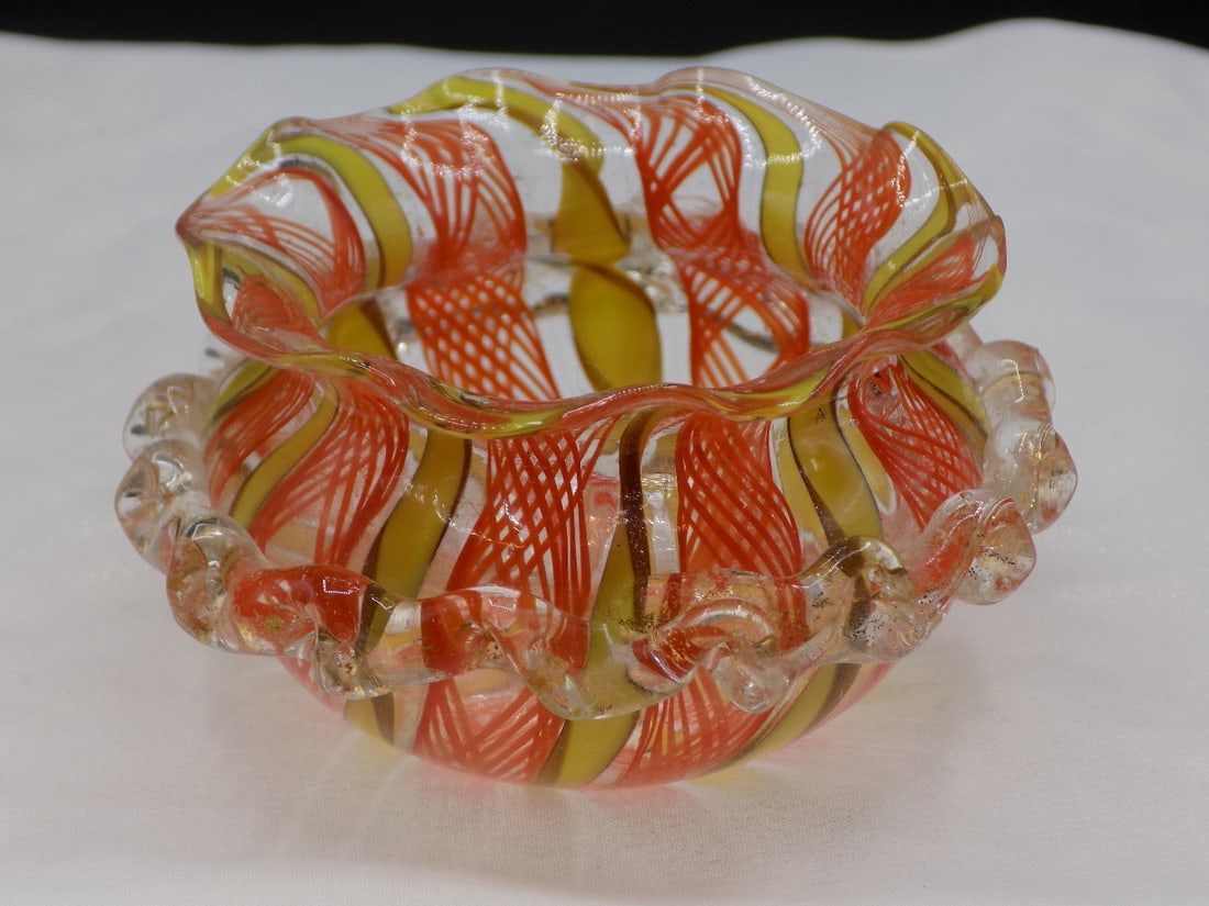 Vintage Murano latticino and ribbon art glass bowl: Vintage Murano latticino and ribbon art glass bowl. Gold dust interior decoration. Beautiful colors. Great quality and detail. In very good original condition. 1 ¾ inches tall x 3 ¼ wide
