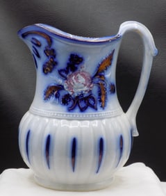 Vintage decorated flow decorated blue milk pitcher