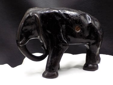 Antique cast iron elephant doorstop.