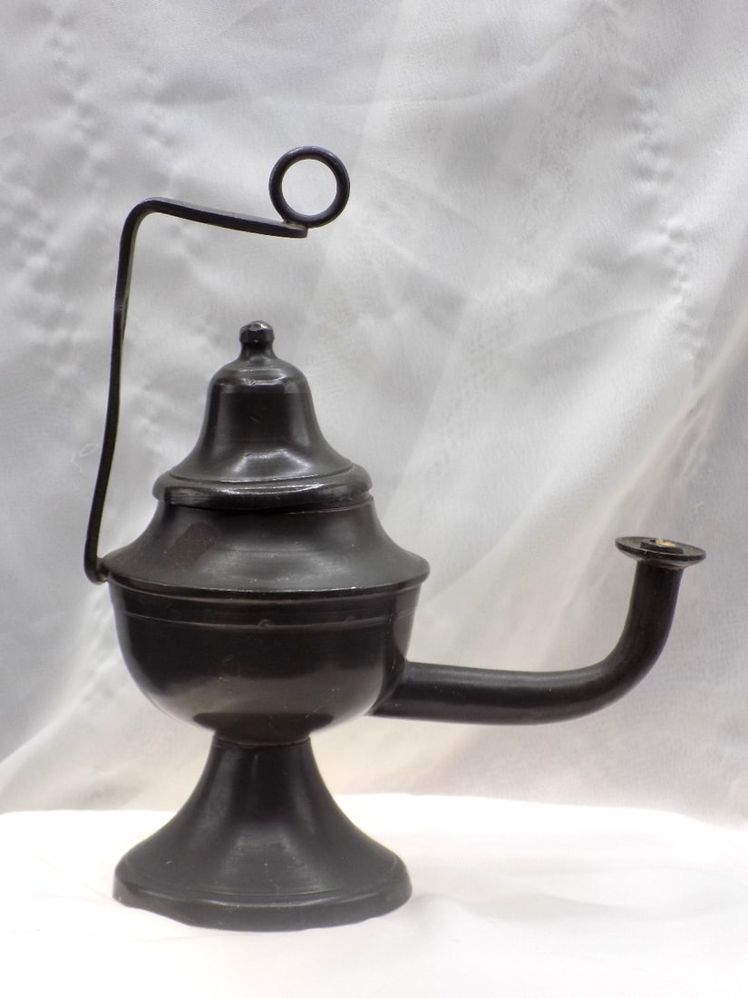 Antique pewter whale oil lamp.: Antique pewter whale oil lamp. Marked as show in photos. Great quality and detail. In very good original as found condition. 7 ¼ inches tall.