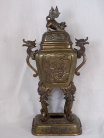 Ornate vintage Oriental bronze lidded vase with foo dog and dragons