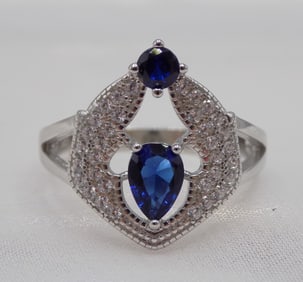 Beautiful 2 cwt blue sapphire and topaz sterling silver ring