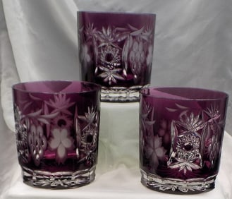 Three beautiful cut to clear art glass cocktail or whiskey glasses