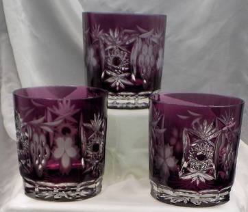 Three beautiful cut to clear art glass cocktail or whiskey glasses: Three beautiful cut to clear art glass cocktail or whiskey glasses. Ajka Marsala amethyst purple cut to clear. Great quality and detail. In very good original as found condition. Two are 3 7/8 inches